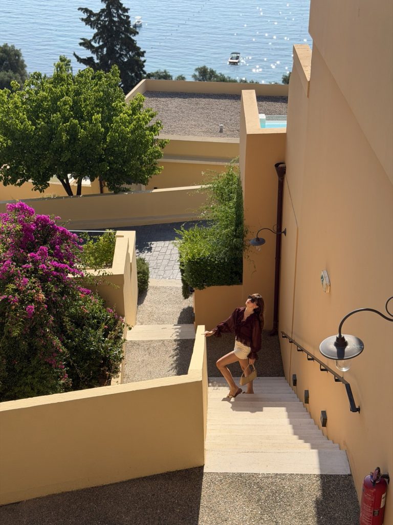 Steps and terraced architecture at the Nido, Mar-Bella Collection hotel in Corfu with a view of the Ionian Sea
